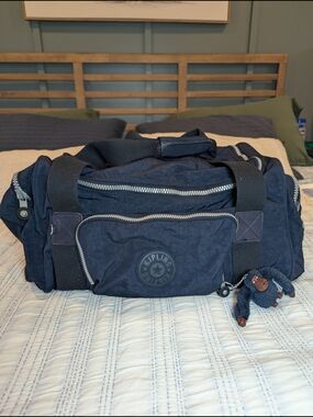 Kipling Navy Blue Duffel Bag with Monkey Keychain